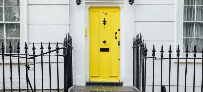 yellow front door of a Philadelphia home