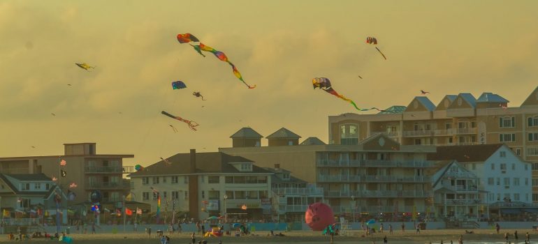 kites flying over the beach in one of the best Maryland places ranked by average house prices